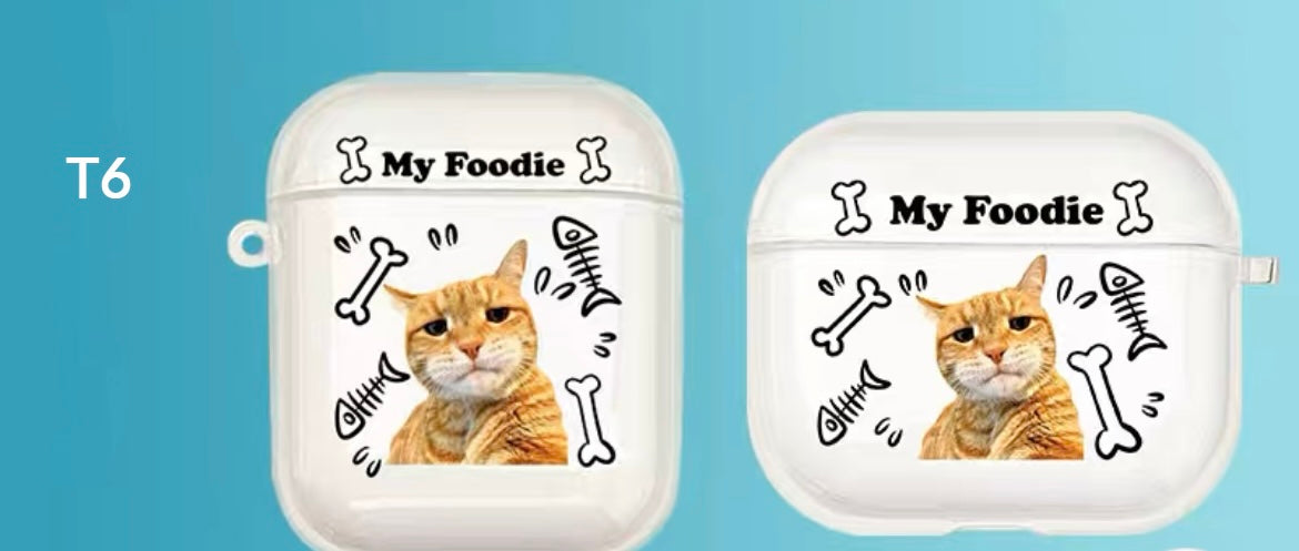 A custom AirPods case with a cat's face and the text 'My sweetie', along with decorative flowers and hearts.