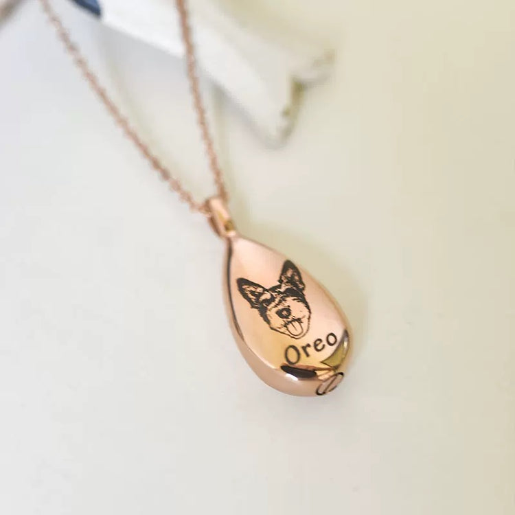 Rose gold teardrop pendant with Personalized a dog's face and name 'Oreo'