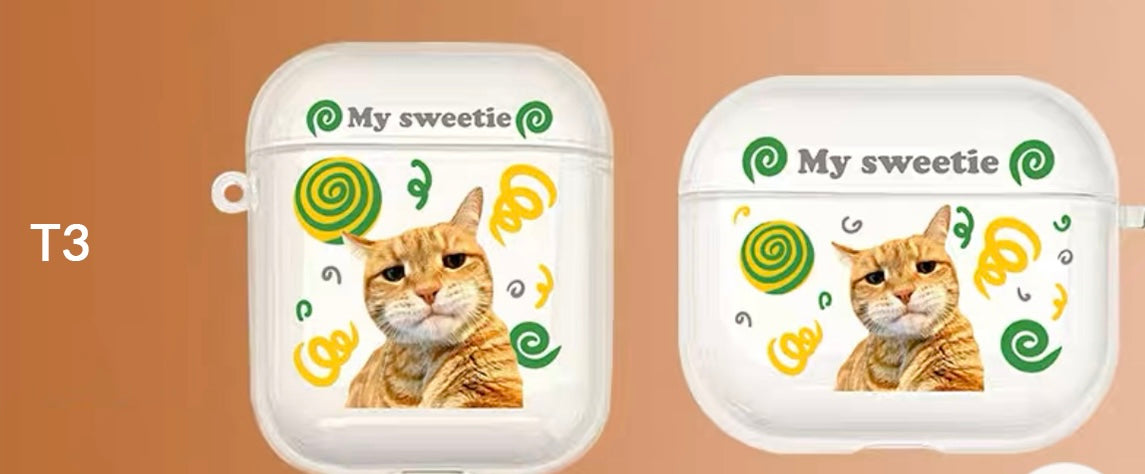 A custom AirPods case with a cat's face and the text 'My sweetie', along with decorative flowers and hearts.