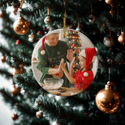 Personalized heart-shaped ceramic ornament for a first Christmas