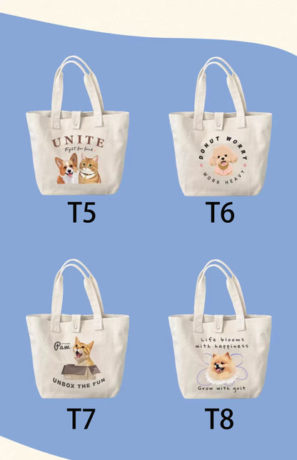 Four tote bags with dog-themed designs on a blue background.