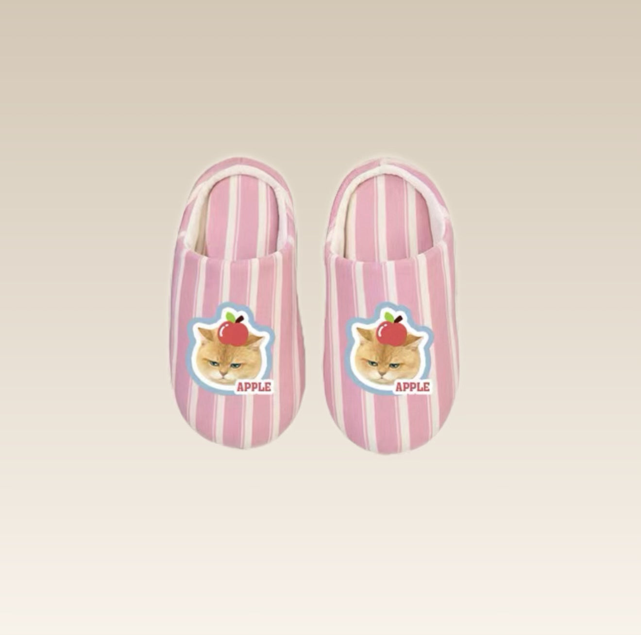 Pair of pink striped slippers with a cat 