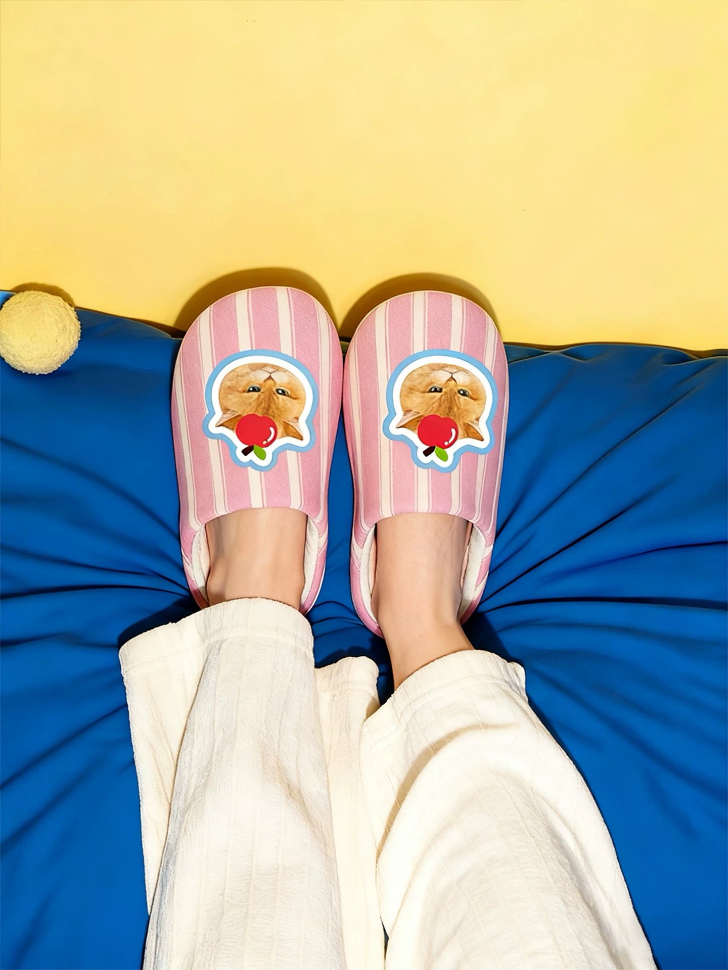 Pink slippers with cartoon dog design