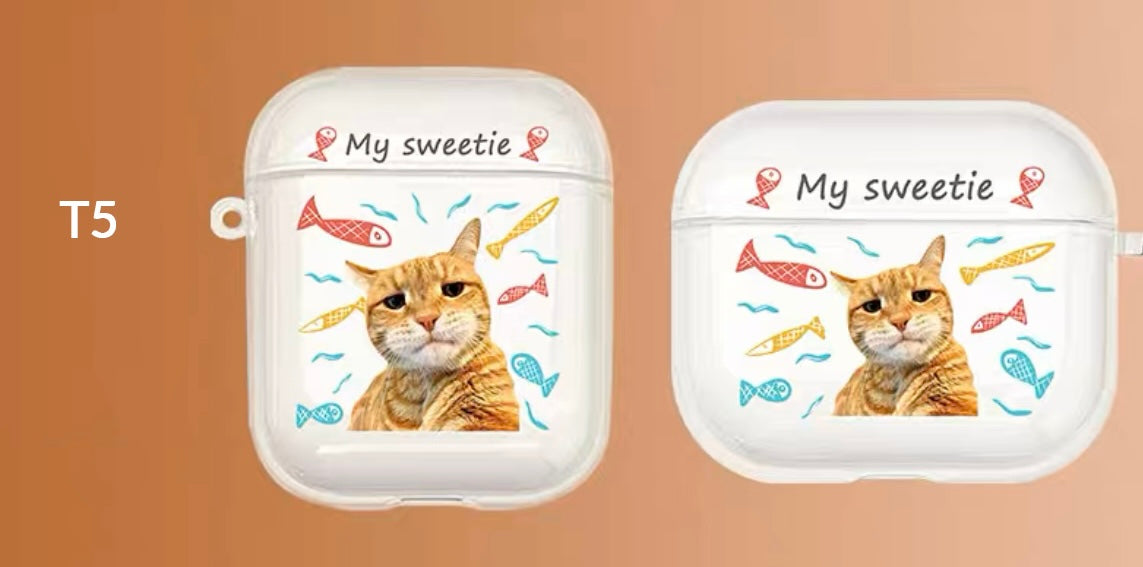 A custom AirPods case with a cat's face and the text 'My sweetie', along with decorative flowers and hearts.